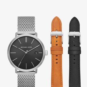 Michael Kors Silver Watch with Black Dial and Straps

Needs new battery